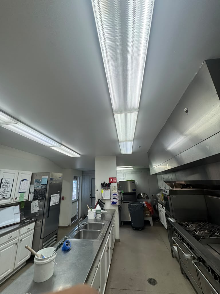 Commercial kitchen painting project, wide view