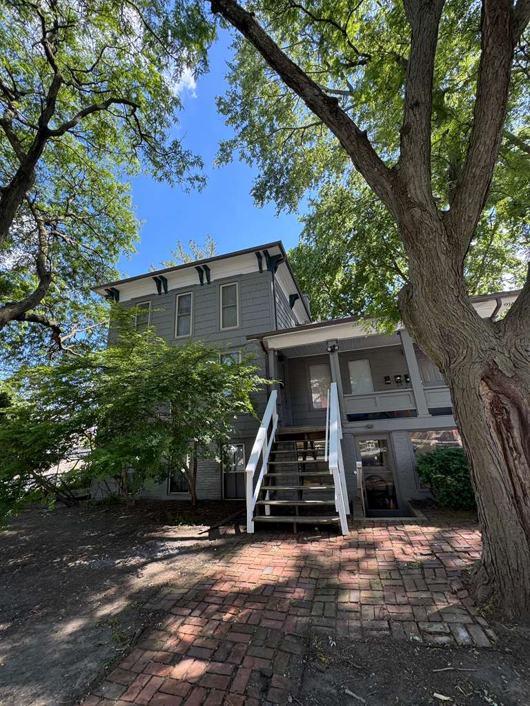 House exterior after full repaint by Mechan LLC
